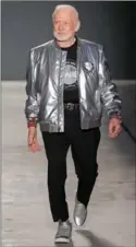  ??  ?? Astronaut Buzz Aldrin walks the runway at the Nick Graham New York Fashion Week 2017 men’s show in New York City.
