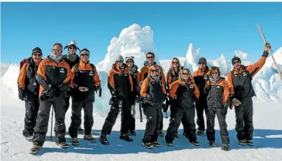  ?? ANTARCTICA NZ ?? TEDx speakers gather on the ice near Scott Base. The team helped to mark 60 years of Kiwi scientific work on the continent.
