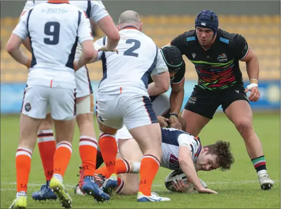  ??  ?? Chris Dean keeps possession as Edinburgh won in Italy, much to the delight of captain Grant Gilchrist (below)