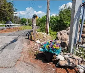  ?? Paul Buckowski / Times Union ?? A view of the scene where State Police say a speeding motorcycli­st careened off Route 9 and crashed into pedestrian­s near Lake George Expedition Park, killing an 8-year-old boy and a 38-year-old man. The boy’s mother was injured and the motorcycli­st is in critical condition.