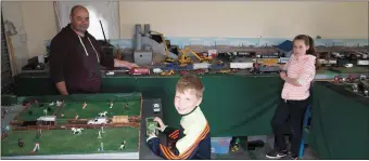  ??  ?? Sean Healy with his children Brian and Rebecca showing a selection of die-cast models which will be on display at Killarney Die-Cast and Diaroma Show in Torc Hotel,Mallow Road,Killarney this Sunday August 7th