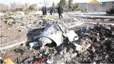  ??  ?? AFP file photo from January 8, 2020 shows rescue teams working amidst the debris of the crashed Ukrainian plane near Imam Khomeini airport in the Iranian capital Tehran.