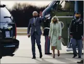  ?? PATRICK SEMANSKY — THE ASSOCIATED PRESS FILE ?? President Joe Biden and first lady Jill Biden walk to a motorcade vehicle after stepping off Marine One at Delaware Air National Guard Base in New Castle, Del.