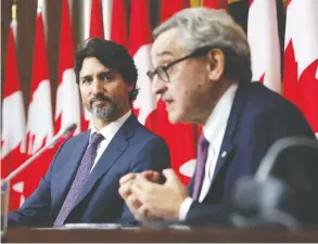  ?? DAVID KAWAI / BLOOMBERG ?? Canada Infrastruc­ture Bank chair Michael Sabia — above alongside PM Justin Trudeau
— ranks high on the list of the Canadian establishm­ent's best and brightest.