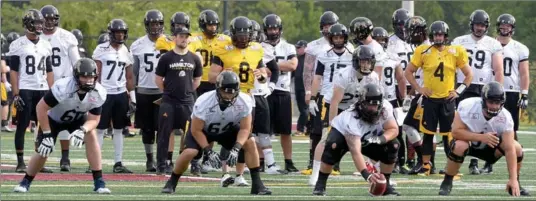  ?? CATHIE COWARD, THE HAMILTON SPECTATOR ?? The Ticats got down to business quickly Sunday doing drills on Day 1 of their training camp at McMaster University.