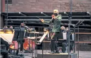  ?? Amanda Tipton, Colorado Symphony ?? Colorado Symphony resident conductor Christophe­r Dragon on stage at Red Rocks Amphitheat­re during the symphony’s Vivaldi program in September. Dragon’s contract was extended through the 20232024 season.