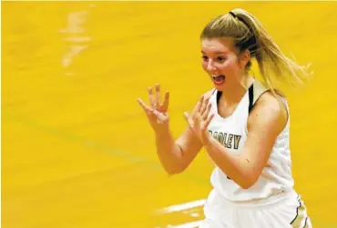  ?? STAFF PHOTOS BY C.B. SCHMELTER ?? Bradley Central’s Kaleigh Hughes celebrates after defeating East Hamilton in the District 5-AAA championsh­ip game Monday at Soddy-Daisy High School.