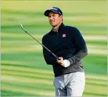  ?? GREGORY SHAMUS / GETTY IMAGES ?? Adam Scott of Australia plays a shot during a practice round for The Players Championsh­ip at TPC Sawgrass in Ponte Vedra Beach, Fla., on Wednesday.