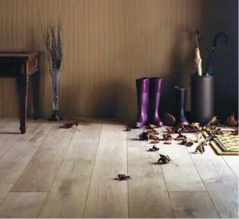  ?? METROPOLIT­AN HARDWOOD FLOOR ?? Engineered wood does not swell and shift like natural wood, and performs beautifull­y in high-traffic areas.