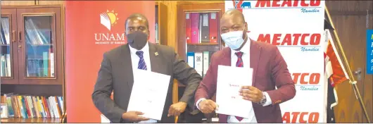  ?? Photo: Contribute­d ?? For a good cause… Unam vice chancellor Kenneth Matengu and Meatco CEO Mwilima Mushokaban­ji during the signing of the agreement on Tuesday.