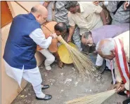  ?? IANS ?? BJP chief Amit Shah participat­es in a cleanlines­s drive in Hyderabad as part of Prime Minister Narendra Modi’s ’Swachhata Hi Seva’ movement launched on Saturday.