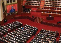  ?? ANDY WONG/ASSOCIATED PRESS ?? Chinese Premier Li Keqiang speaks during the opening session of China’s National People’s Congress at the Great Hall of the People in Beijing on Friday.