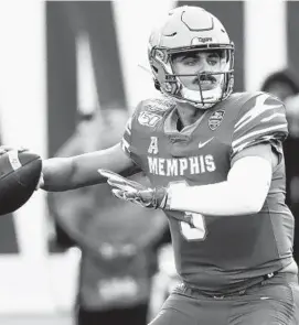  ?? MARK HUMPHREY/AP ?? Quarterbac­k Brady White directs a Memphis offense that ranks 10th nationally in total yards per game. White recently became the winningest quarterbac­k in program history.