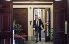  ?? CP PFILE PHOTO ?? Premier Jason Kenney makes his way to the chamber at the Alberta Legislatur­e on March 20. Alberta politician­s are coming back to the legislatur­e this week to sit until late July, passing 10 bills while continuing to keep social distance and dealing with the COVID-19 pandemic.