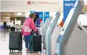  ?? TONY GUTIERREZ AP FILE ?? Lawmakers are considerin­g rolling back a rule that airlines must show the total price of a ticket upfront.