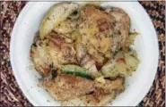  ?? MELISSA D’ARABIAN VIA AP ?? This photo shows chicken with pears and cider in Bethesda, Md. This dish is from a recipe by Melissa d’Arabian.