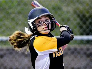  ?? John Heller/Post-Gazette ?? Liz Scherer has been a leader at North Allegheny, both at the plate and behind it as catcher.