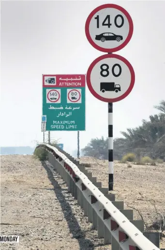  ?? Chris Whiteoak / The National ?? Conflictin­g speed limits are displayed on the E11 in the direction of Abu Dhabi on Sunday, above left. Above, the same stretch of road yesterday