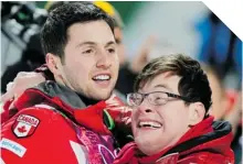 ?? ANDY WONG/ THE ASSOCIATED PRESS ?? HEART OF GOLD Alex Bilodeau, left, celebrates with his brother Frederic after winning the gold medal in men’s moguls .
