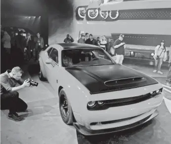  ?? JULIE JACOBSON/AP ?? The 2018 Dodge Challenger SRT Demon goes 0 to 60 mph in 2.3 seconds. The National Hot Rod Associatio­n certified it as the world’s fastest quarter-mile production vehicle.