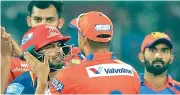  ??  ?? Suresh Raina consoled Rishabh Pant (left) after the latter missed his hundred by three runs on Thursday.