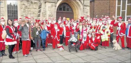  ??  ?? SANTA BABY: Participan­ts of all ages took part in the Santa Dash for Michael Sobell Hospice Charity on Saturday December 3, including some Santa dogs