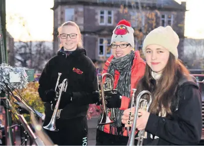  ??  ?? Chance to say thank you Naomi Parish, Leah Menzies and Lucy Douglas of Brass Central Strathearn pictured previously