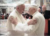  ?? PICTURE: AP ?? Pope Francis, left, and retired Pope Benedict XVI embrace during a ceremony to celebrate Benedict’s 65th anniversar­y of his ordination as a priest, in the Clementine Hall of the Apostolic Palace, at the Vatican, last month.