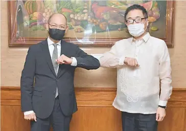  ?? PHOTOGRAPH COURTESY OF BSP ?? Touching base Bangko Sentral ng Pilipinas Governor Benjamin E. Diokno (left) and Japanese Ambassador to Manila Koshikawa Kazuhiko discussed economic cooperatio­n initiative­s during the diplomat’s recent courtesy call at the BSP head office in Manila.