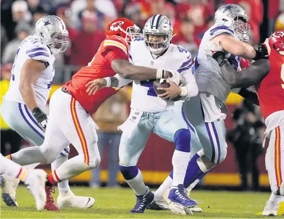  ?? CHARLIE RIEDEL/AP ?? Chris Jones sacks Dak Prescott in a game in which the Chiefs handcuffed the NFL’s highest-scoring offense.