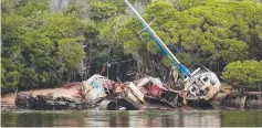  ??  ?? DUMPED: Abandoned boats in Trinity Inlet. Picture: MARC McCORMACK