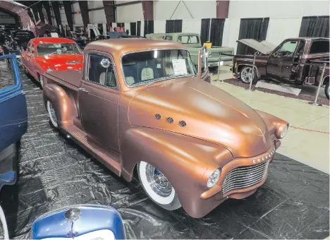  ?? CAM HUTCHINS ?? The colour and custom grille of this 1954 Chevy with the 6.0 LS V-8 engine caught the eye at the B.C. Classic and Custom Car Show.