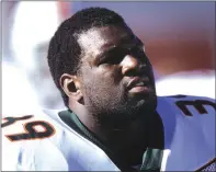  ?? CRAIG JONES / GETTY IMAGES ?? LaVaar Scott (above), the brother of Larry Scott, was a defensive end at Miami and played on UM’s national championsh­ip team in 2001 under coach Larry Coker.