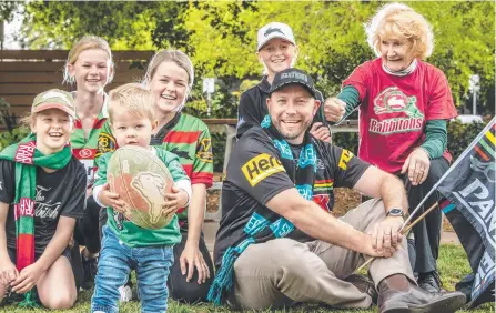  ?? Picture: Nev Madsen ?? ALL SET: Rabbitohs fans (from left) Ellie Sharpe, Emma Sharpe, Hudson Glass, Beccy Glass, Jack Sharpe and Jan Ede with Penrith fan Nick Hauser (front).
