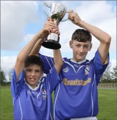  ??  ?? Darragh Harris and Jack Hennessy, the victorious joint captains.