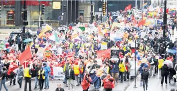  ?? | SUN- TIMES FILE PHOTO ?? Thousands are expected to hit the streets of Chicago on Monday for rallies, marches and protests marking May Day, also known as Internatio­nalWorkers Day.