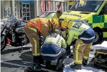  ?? ANDY JACKSON/STUFF ?? A motorcycli­st was hit from behind on a busy New Plymouth intersecti­on.