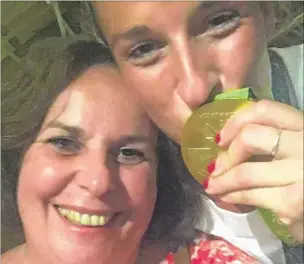  ??  ?? Susannah Townsend celebrates her gold medal with mum Lesley and right, Susannah playing for Canterbury Ladies