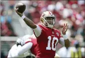  ?? JED JACOBSOHN — THE ASSOCIATED PRESS, FILE ?? 49ers quarterbac­k Jimmy Garoppolo throws a pass during a preseason game against the Raiders on Aug. 29.