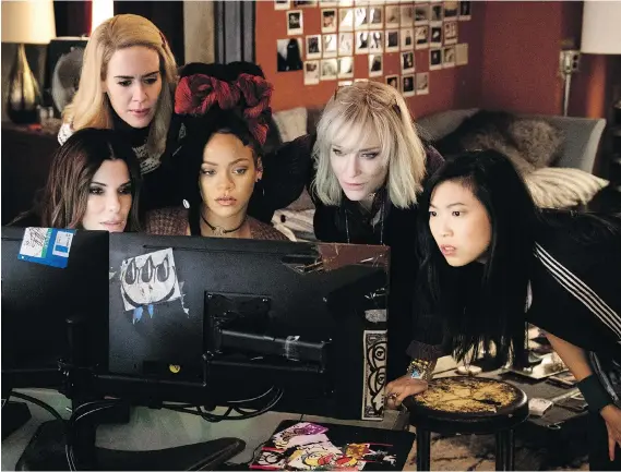  ?? PHOTOS: WARNER BROS. ?? Sandra Bullock, left, Sarah Paulson, Rihanna, Cate Blanchett and Awkwafina in Ocean’s 8, where the characters never mesh or even relax.