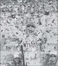  ?? AP PHOTO ?? Kyle Busch celebrates after winning a NASCAR Cup Series auto race on Sunday in Avondale, Ariz.