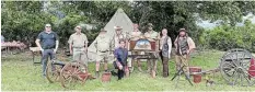  ?? ?? LIVING HISTORY: Bathurst Agricultur­al Museum volunteers and SABRE members relax after setting up at their campsite at the Karel Landman Monument near Alexandria, on December 16 2023.