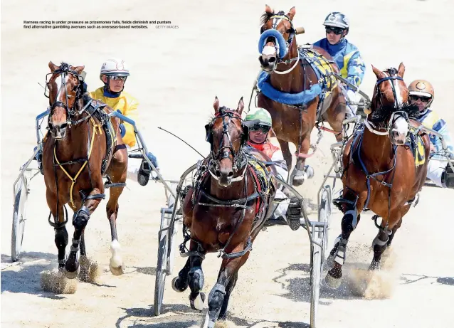  ?? GETTY IMAGES ?? Harness racing is under pressure as prizemoney falls, fields diminish and punters find alternativ­e gambling avenues such as overseas-based websites.