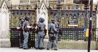  ?? PIX BY ZAHARAH OTHMAN ?? Police presence is visible at street corners and stations in London following the Westminste­r attack on Wednesday.