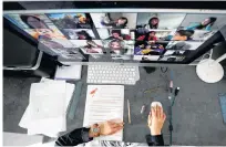  ?? REUTERS ?? A study has found that 63 per cent of remote workers are participat­ing in more meetings online than they would have in the office, with 30 per cent spending two to three hours daily meeting on camera.