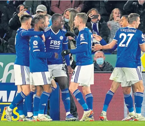  ?? ?? LOOKING GOOD: Ademola Lookman, second left, celebrates with team-mates after scoring Leicester’s winning goal.
