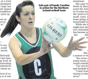 ??  ?? Safe pair of hands: Caroline in action for the Northern
Ireland netball team
