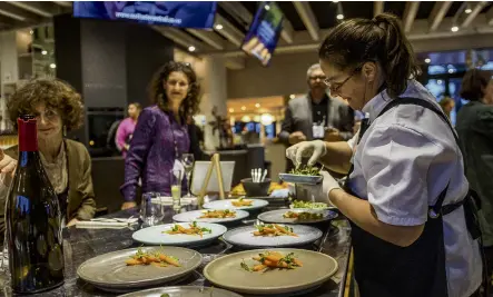  ?? PHOTOS: TOURISM CENTRAL OTAGO ?? Gwen Harvie in her happy place cooking with Central Otago produce.