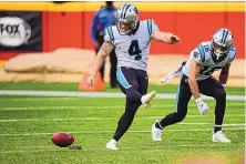  ?? REED HOFFMANN/ASSOCIATED PRESS ?? Carolina kicker Joey Slye (4) attempts an onside kick vs. the Kansas City Chiefs last November. NFL owners have altered rules in hopes of enhancing onside kick opportunit­ies during the 2021 season.