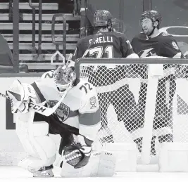  ?? CHRIS O'MEARA AP ?? Tampa Bay’s Tyler Johnson (9) celebrates with center Anthony Cirelli after scoring on Florida goaltender Sergei Bobrovsky (72) during the third period Sunday.